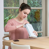 Person opening delivery package