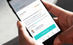 Person viewing results on a phone